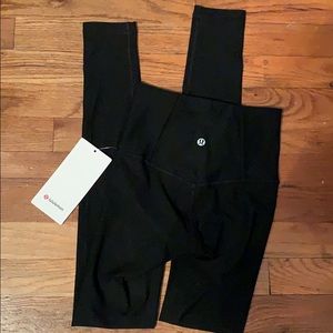 black lululemon tights with mesh detail